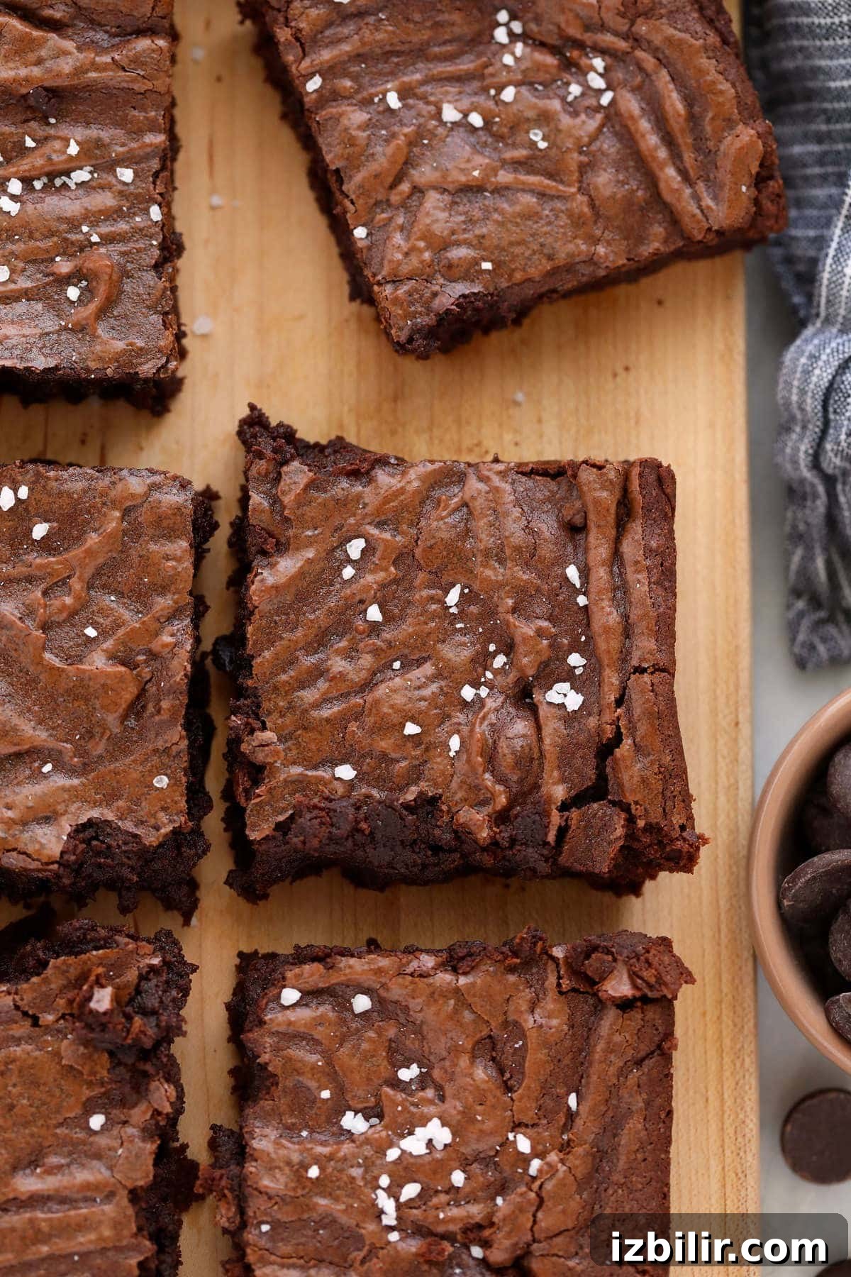 Classic Fudgy Chocolate Brownies Recipe 2 fudgy brownies on cutting board