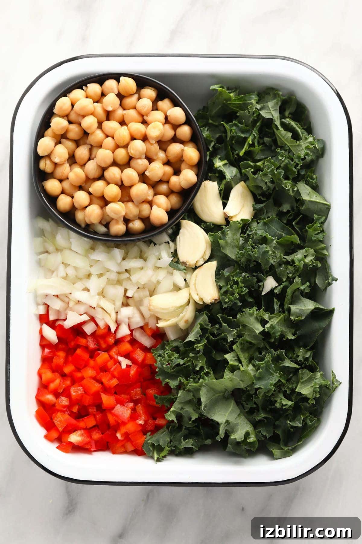chickpea curry ingredients ready to be added to a dutch oven and sauteed