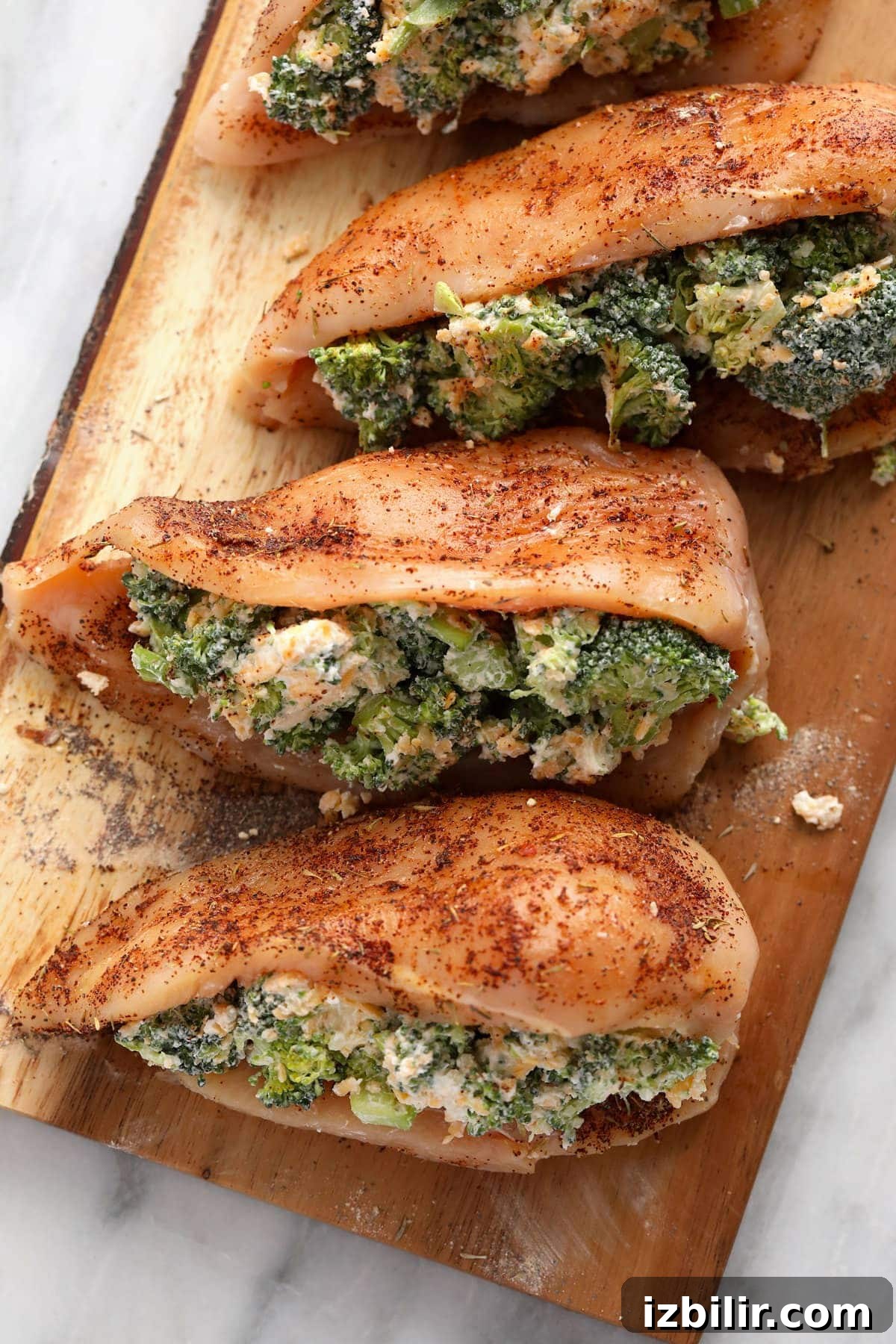 Seared then baked stuffed chicken breasts broccoli and cheese stuffed chicken breasts ready to be seared and then baked.