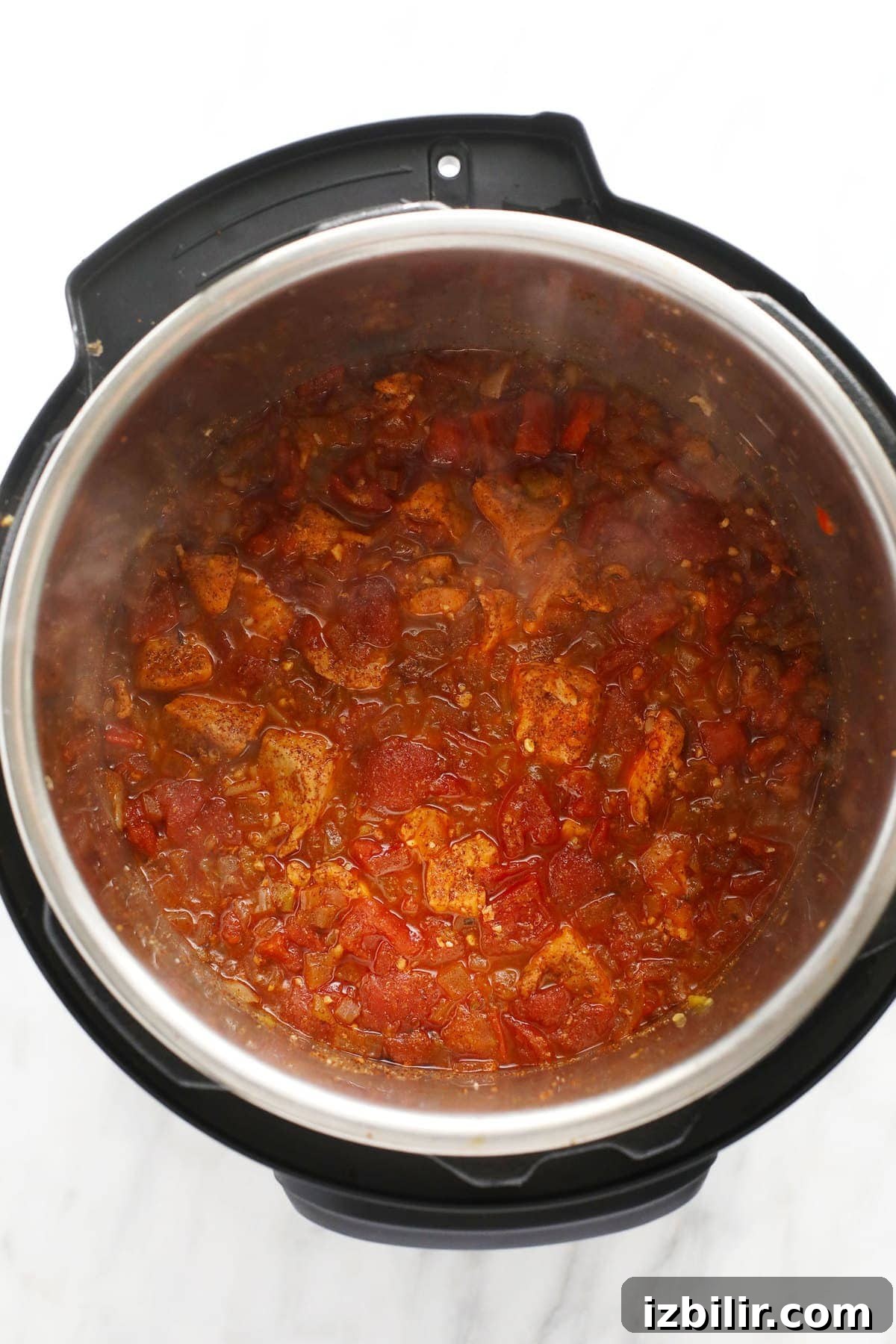 sauteed chicken and tomatoes in the instant pot for instant pot burrito bowls