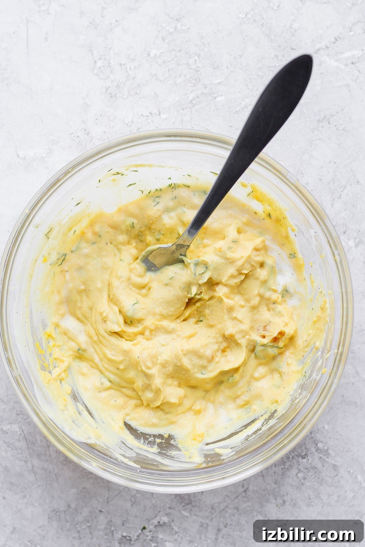 Deviled egg filling mixed together easy deviled eggs filling mixed together with a spoon in a bowl