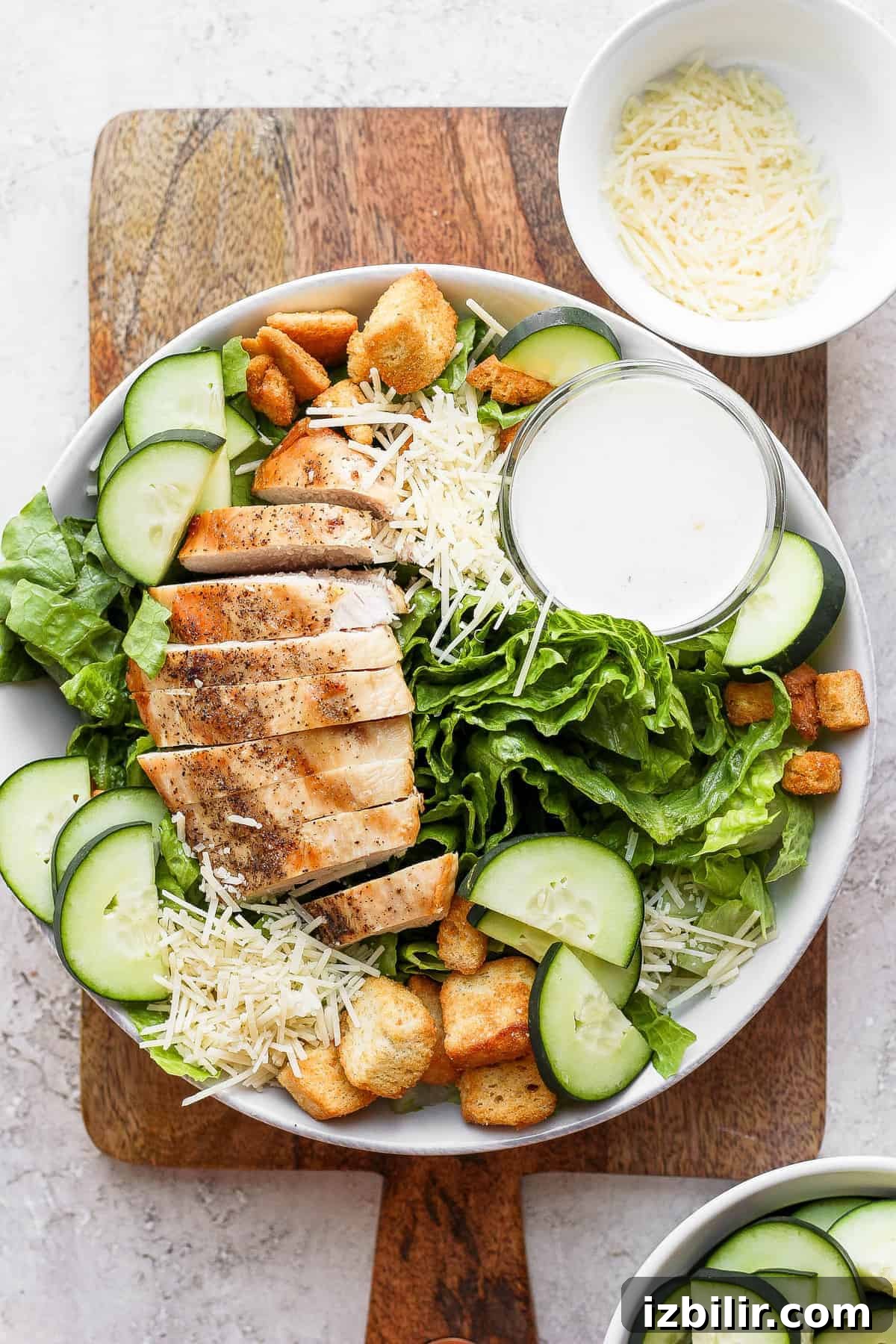 Crispy Chicken Caesar Salad with Homemade Dressing 2 Chicken Caesar salad in a bowl.