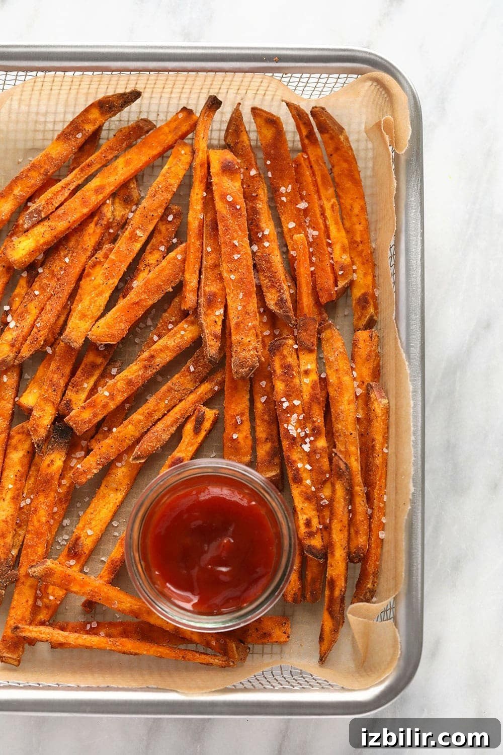 Crispy baked sweet potato fries Sweet potato fries in a basket