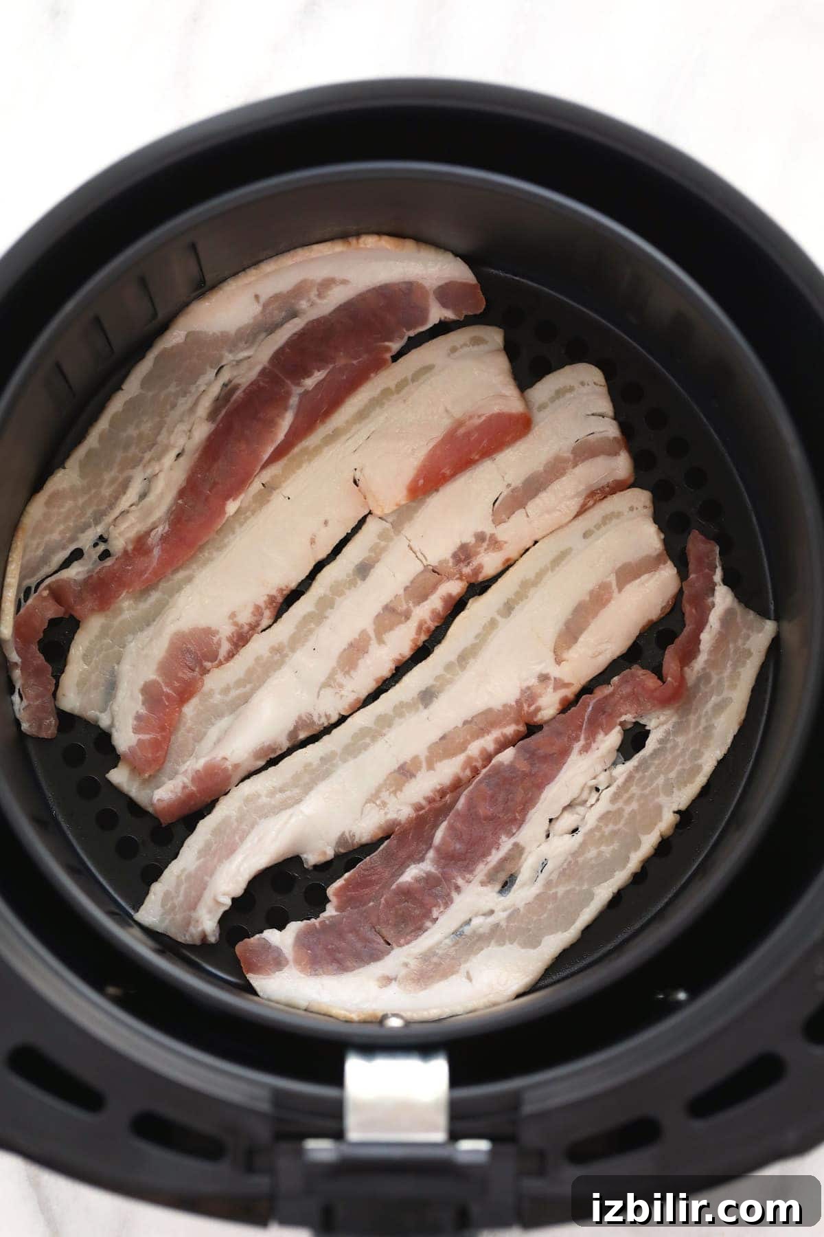 uncooked bacon in air fryer