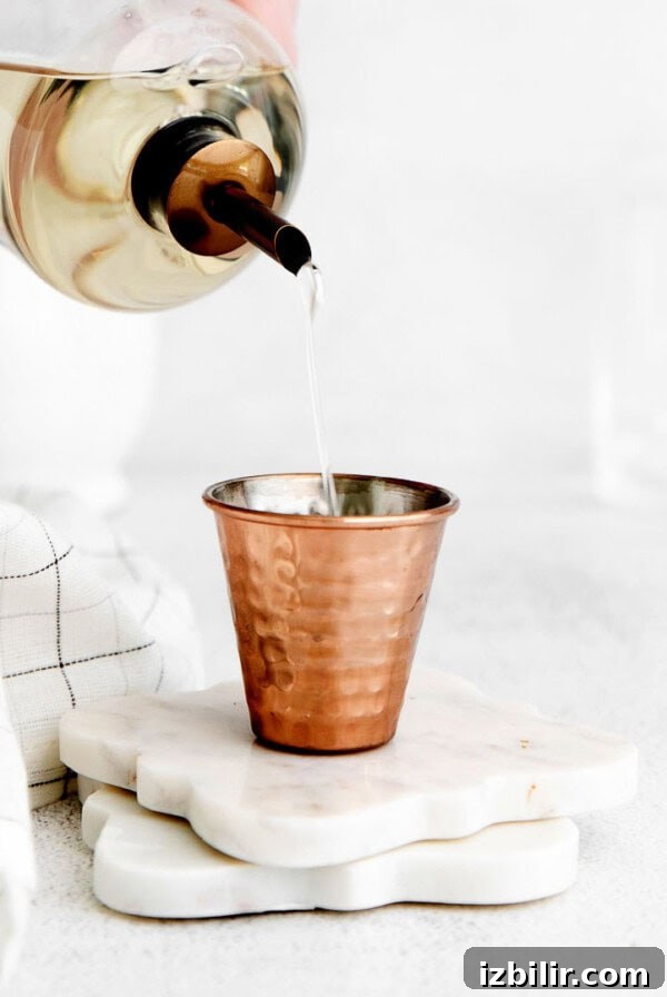 simple syrup in shot glass