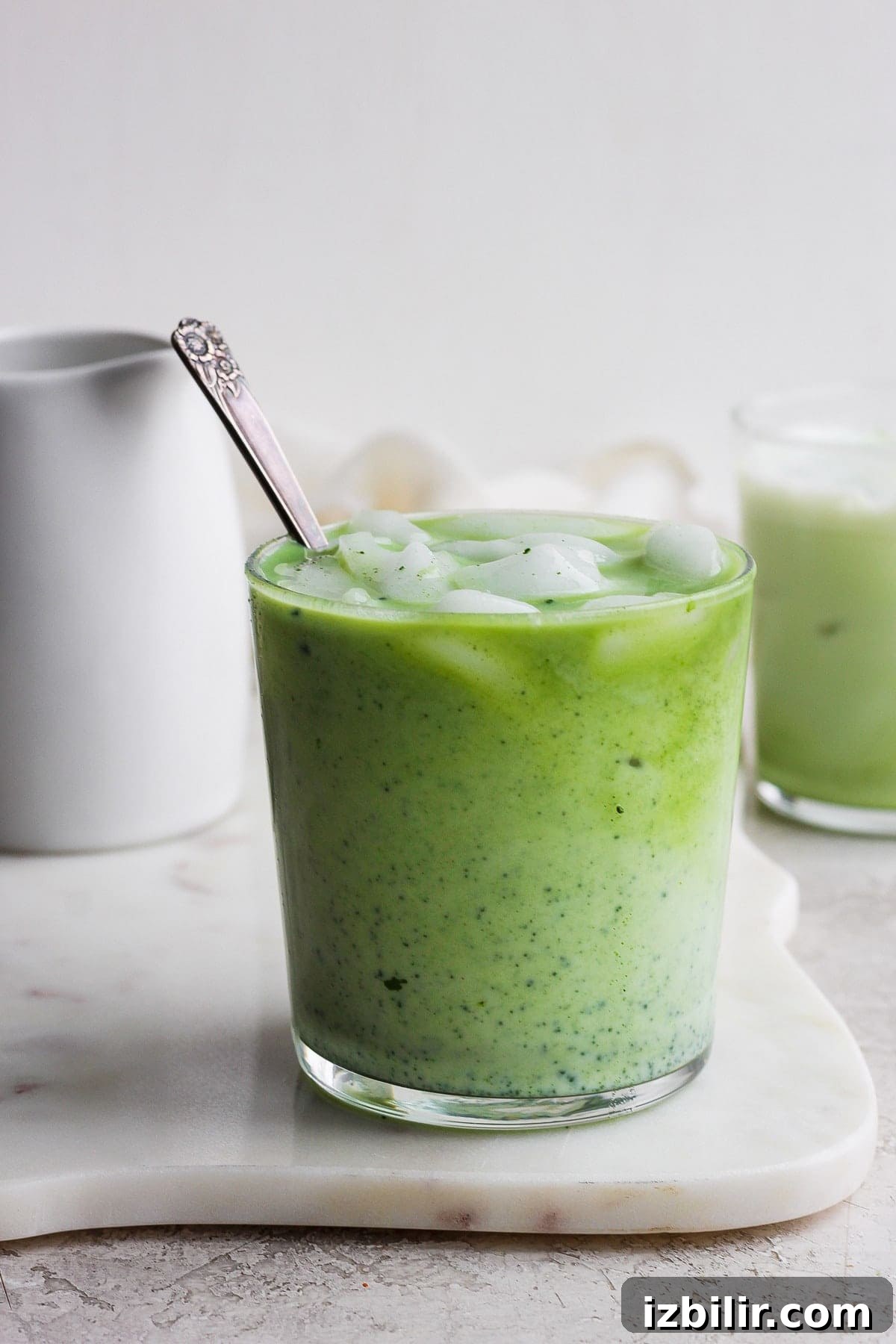 How to Make an Iced Matcha Latte at Home 6 Matcha latte with ice in a glass.