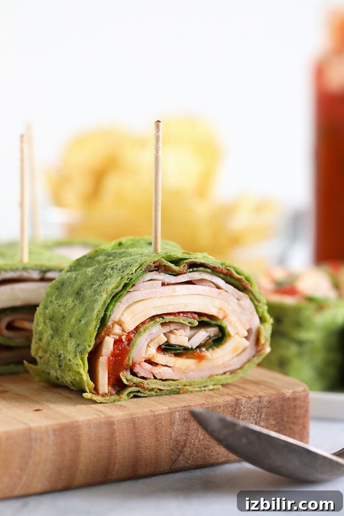 turkey pinwheels on a cutting board