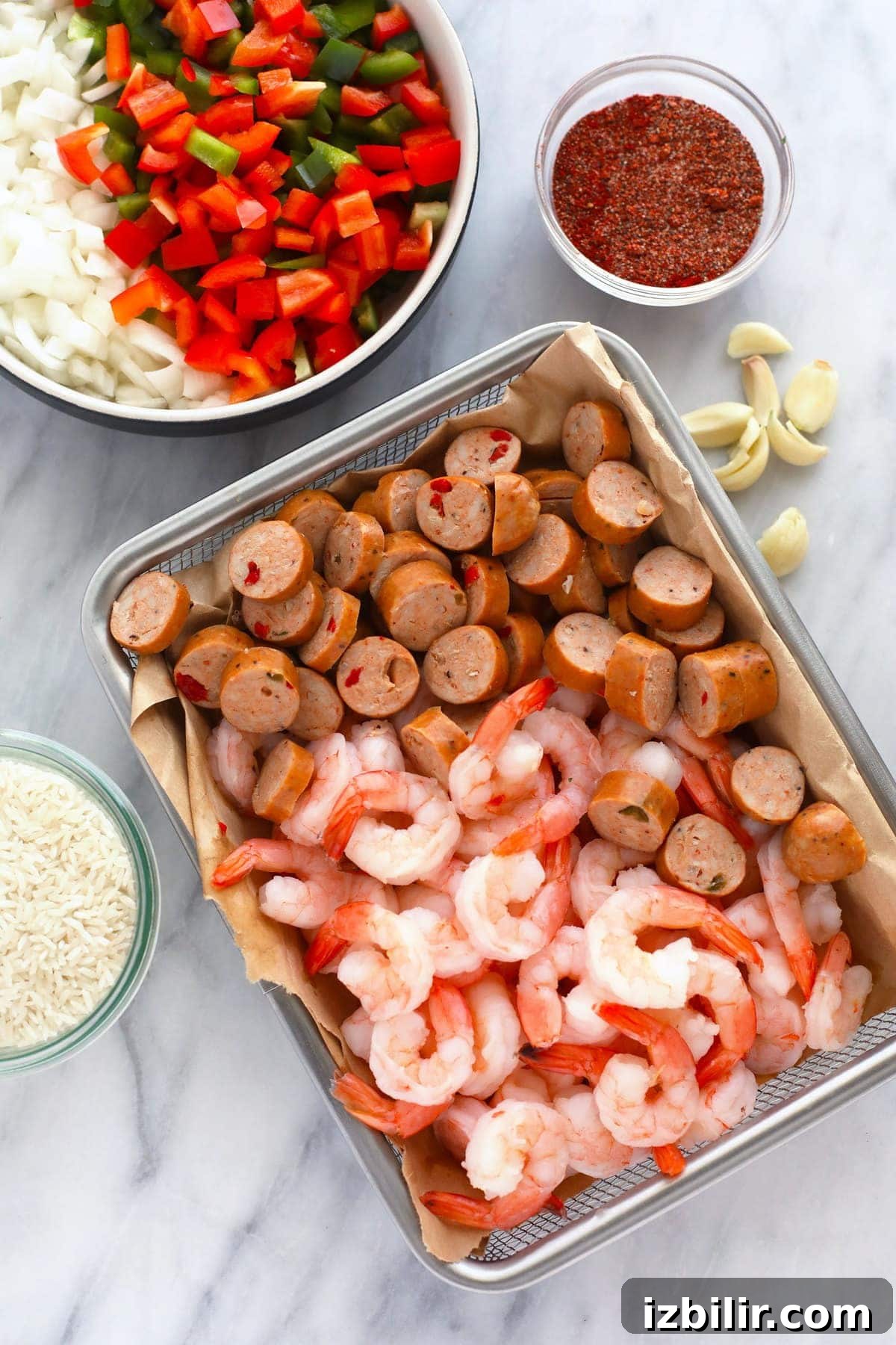 All the ingredients for Instant Pot Jambalaya in bowls.