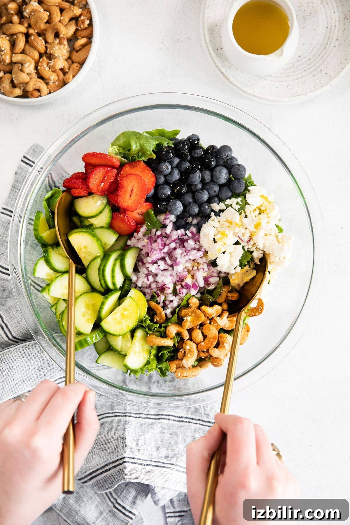 Spring mix salad ingredients in a bowl.