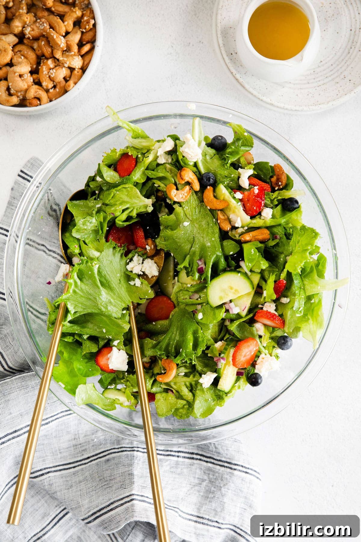 Spring mix salad in a salad bowl.