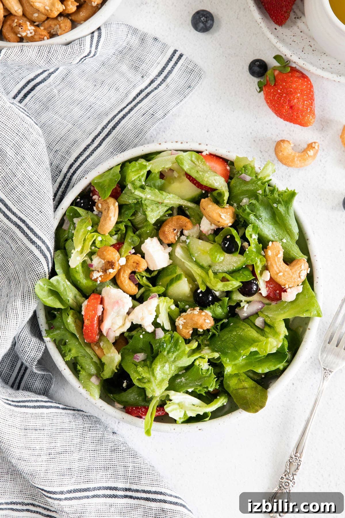 A bowl of spring mix salad.