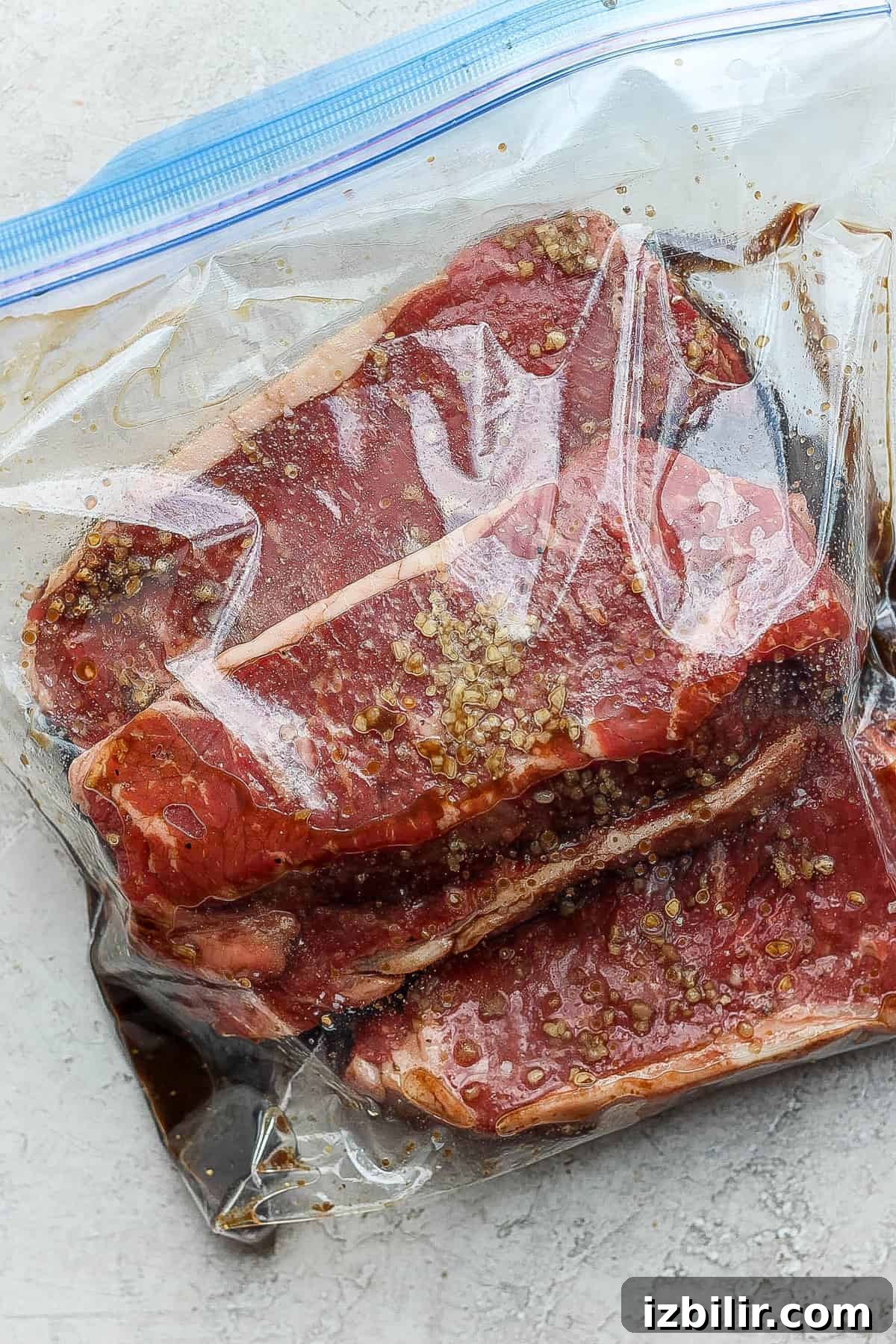 Steaks marinating steaks marinating in plastic bag.