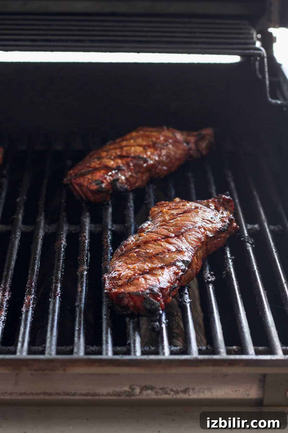 Steaks on grill grilling steaks on gas grill.