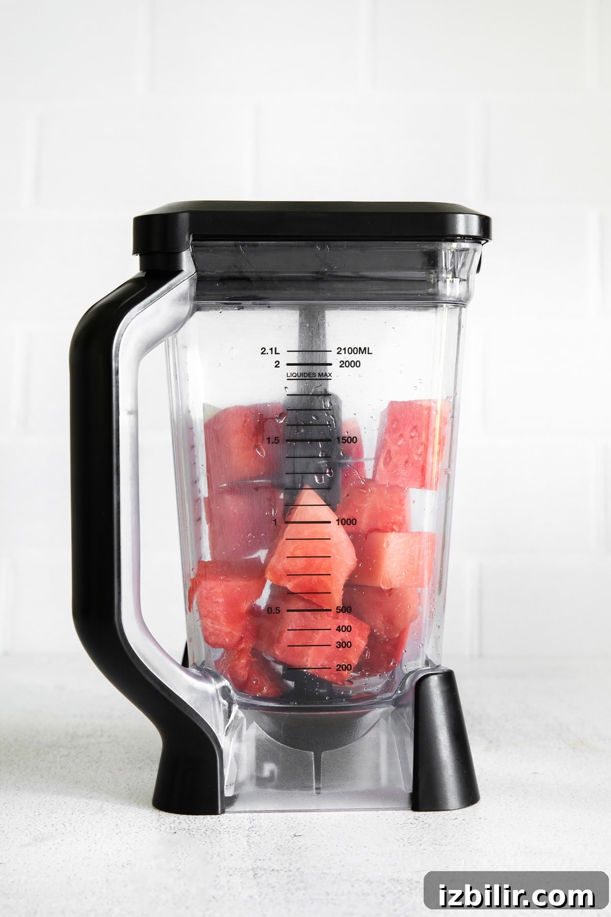 Watermelon cubes in a high speed blender.