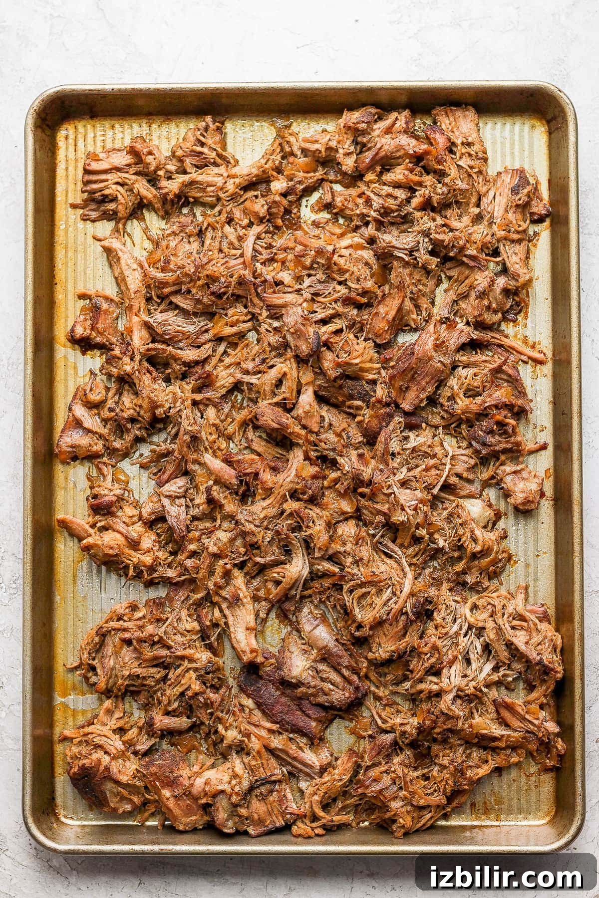 Carnitas on a baking sheet.
