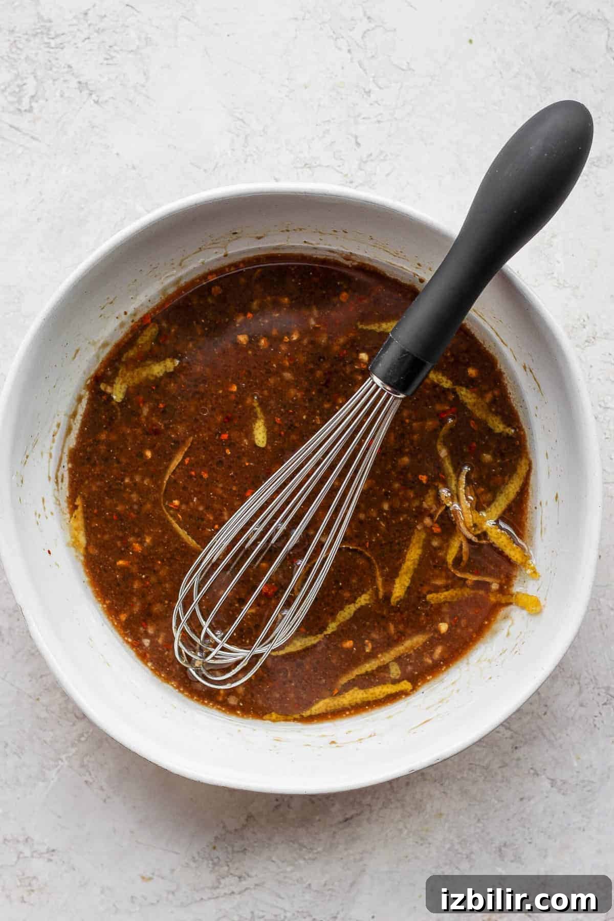 Chicken marinade in bowl.