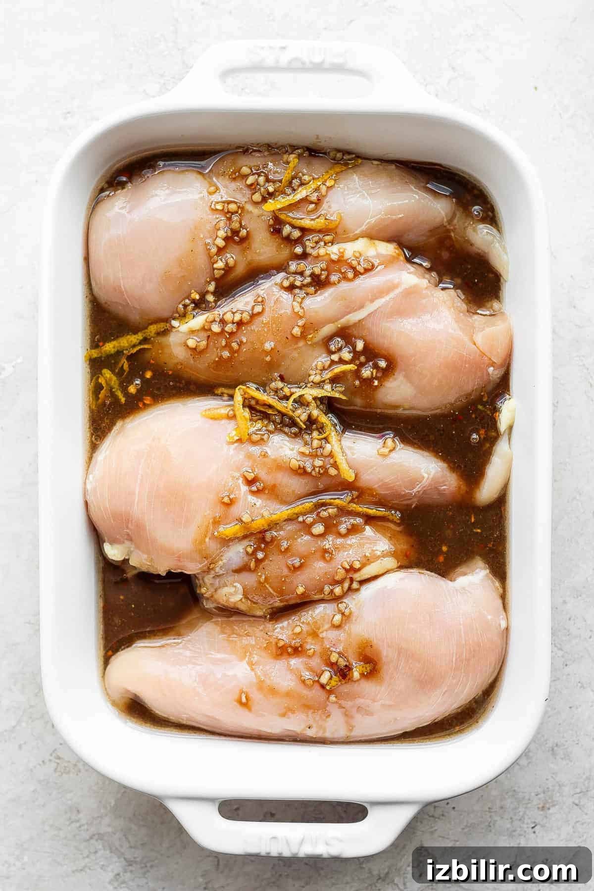 Grilled chicken in a casserole dish.