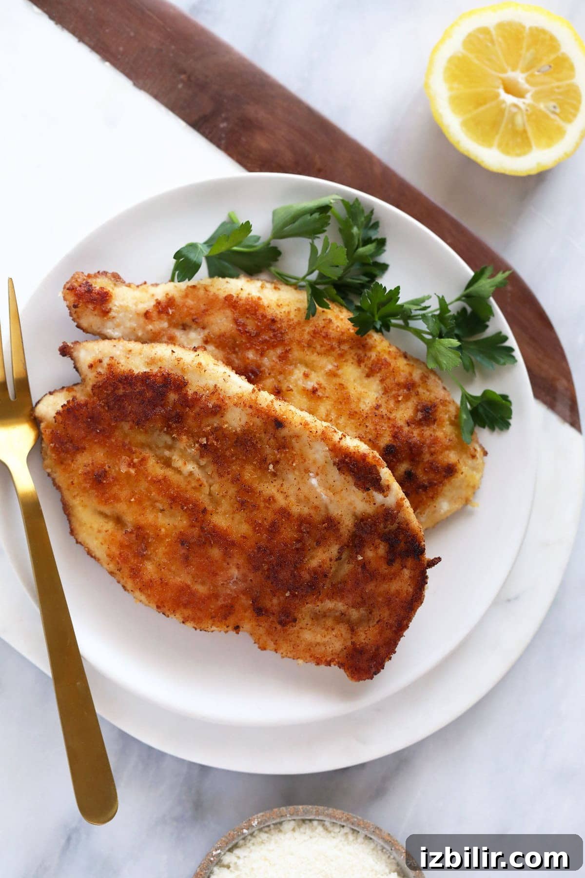 2 chicken breasts on plate