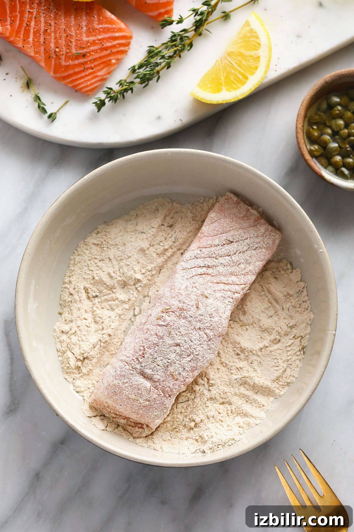 Pan-Seared Salmon Piccata with Lemon Caper Sauce 4 Dredging salmon through flour.