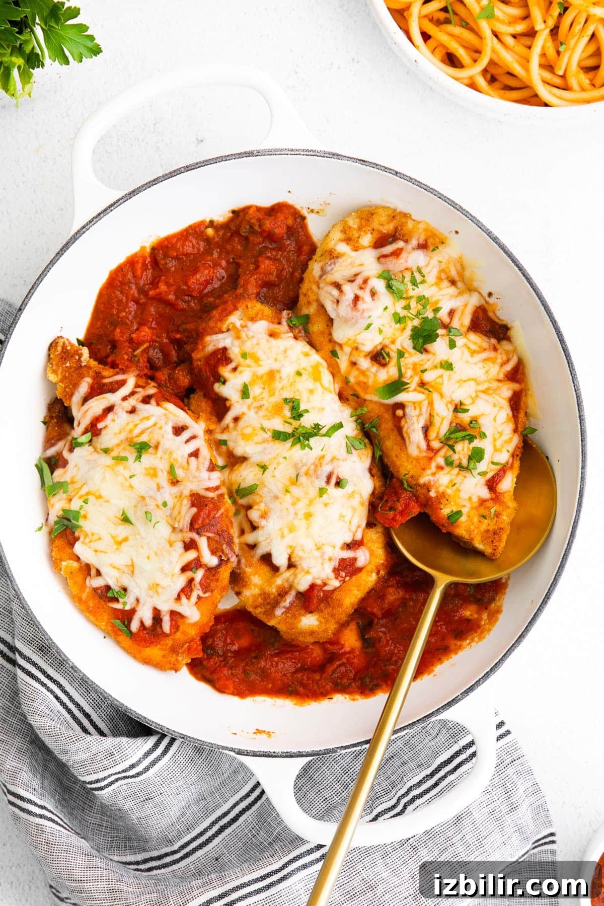 Baked Chicken Parmesan Chicken with marinara and cheese on top.