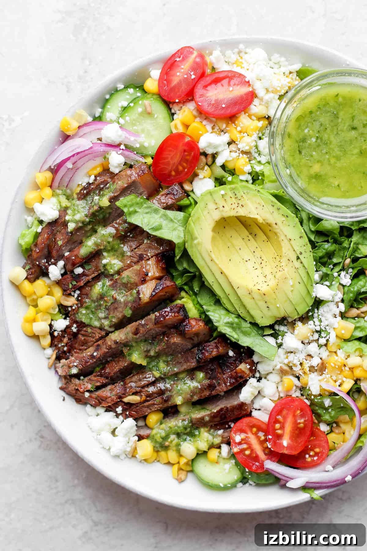 steak salad in bowl.