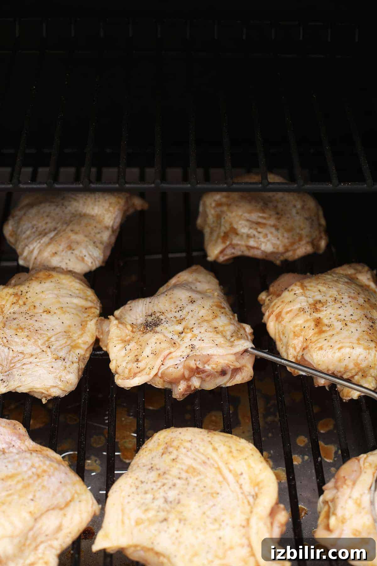 How to Smoke Chicken Thighs for Juicy, Crispy Skin 5 Chicken thighs on the smoker.