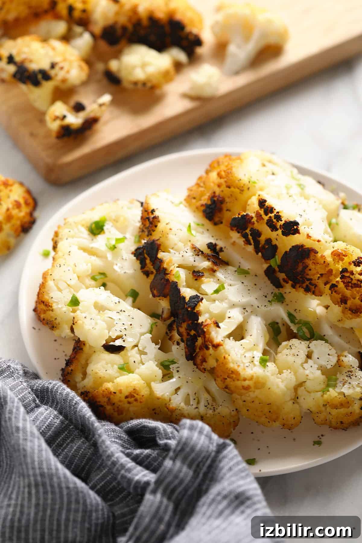 A plate of grilled cauliflower steaks.