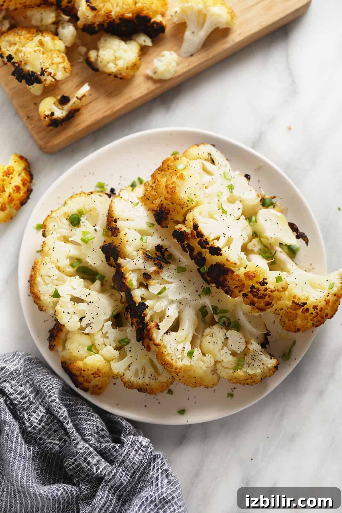 A plate of grilled cauliflower steaks.