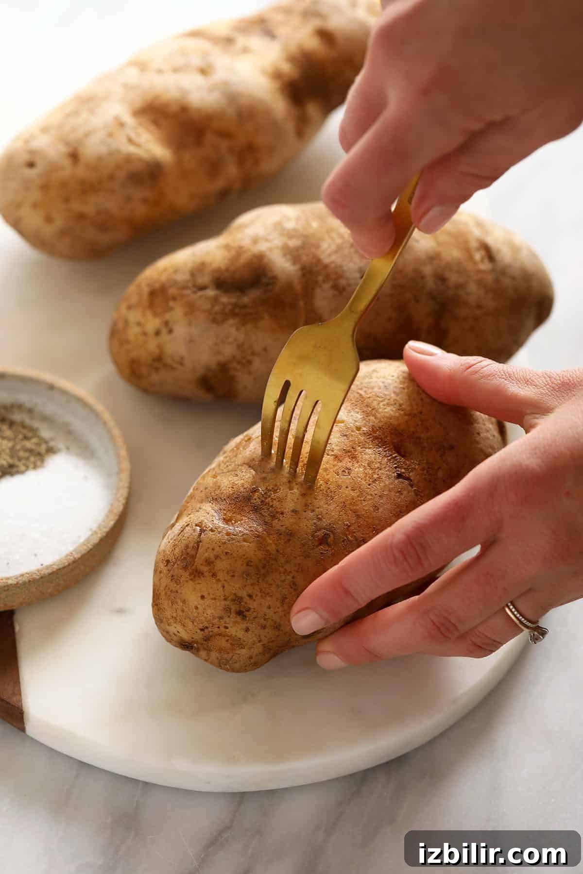 Poke holes in potatoes before smoking poking hole in baked potato with fork