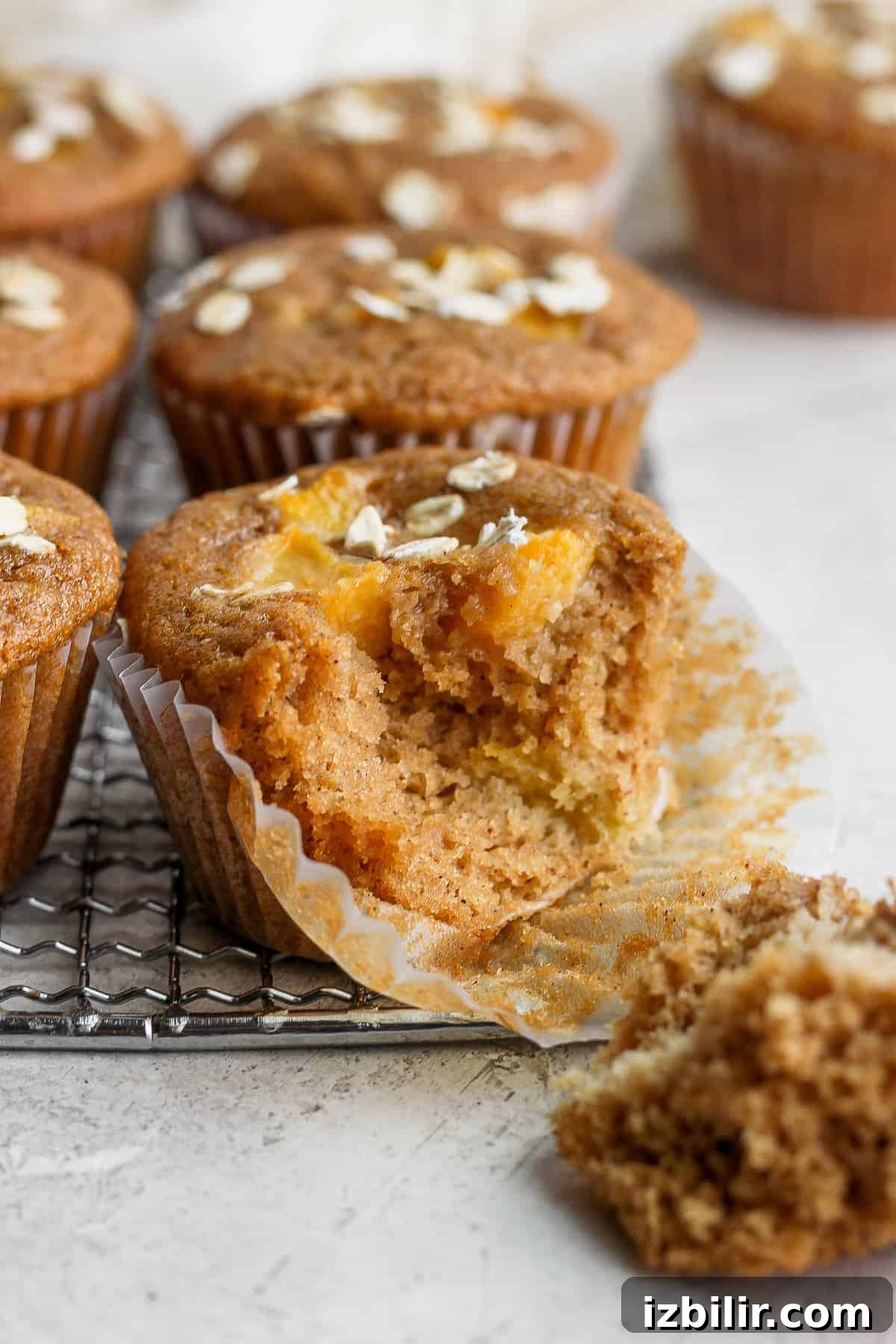 Delicious peach muffin with a bite taken. peach muffin with a bite taken out of it