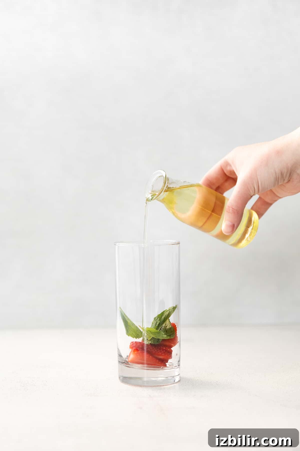 Adding simple syrup to glass