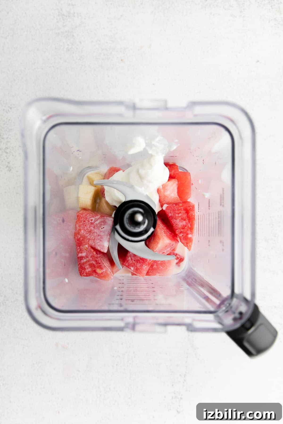 Refreshing Watermelon Smoothie Recipe 4 Watermelon smoothie ingredients in a blender.