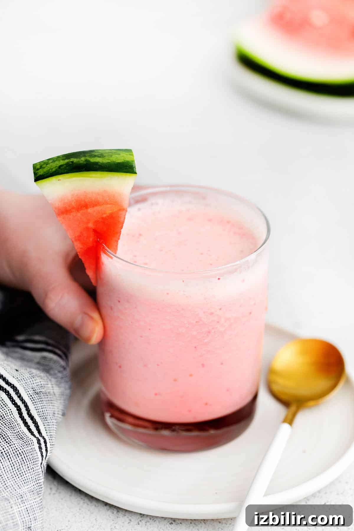 Refreshing Watermelon Smoothie Recipe 6 A watermelon smoothie in a glass.