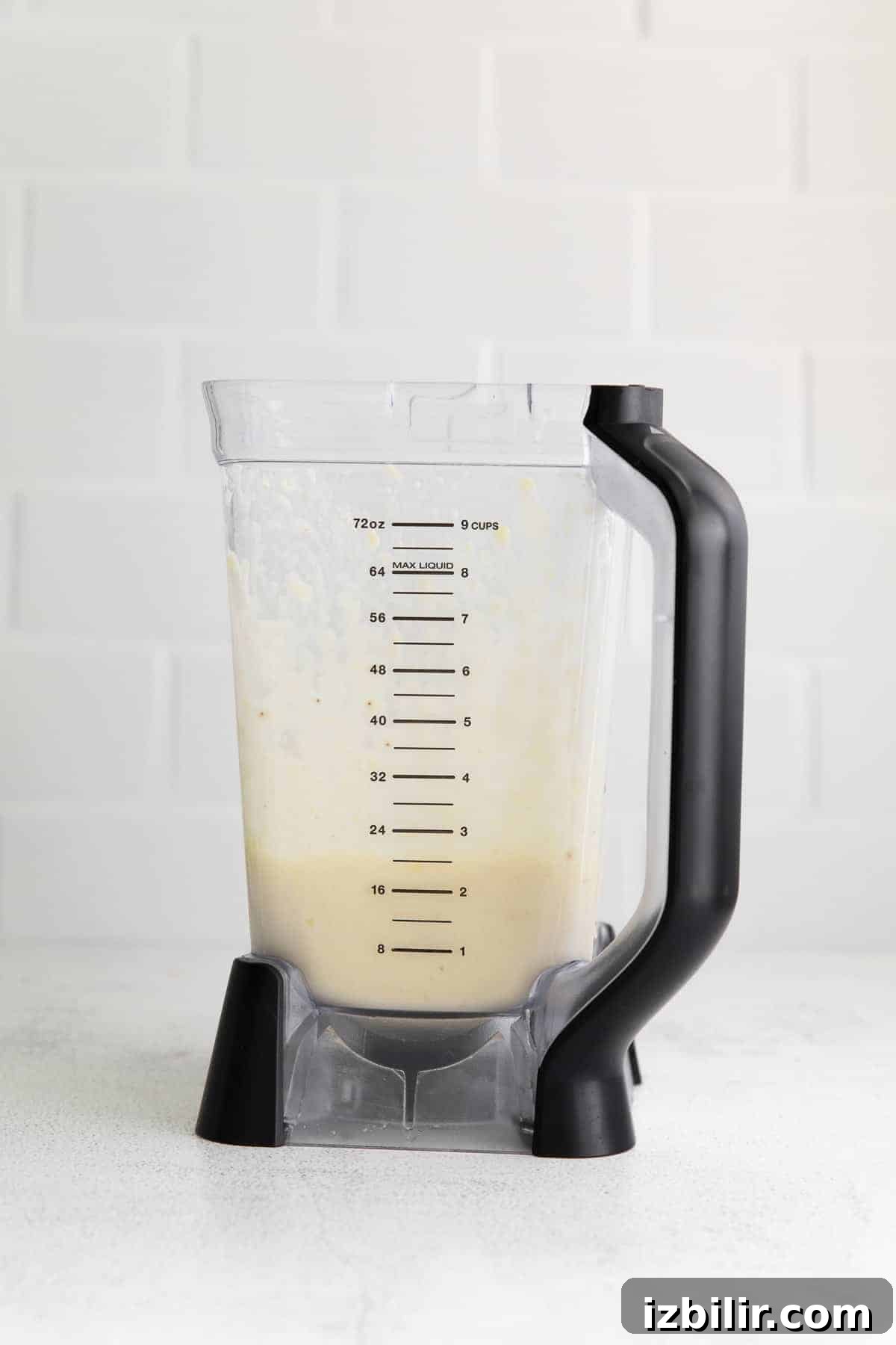 This easy pineapple smoothie recipe is made with frozen pineapple chunks, Greek yogurt, pineapple juice, and a banana. It tastes like tropical paradise! smoothie in blender
