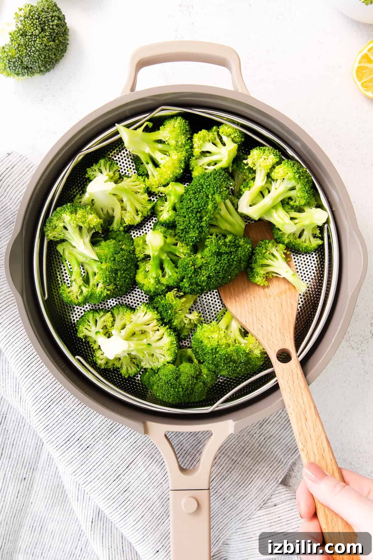Steamed broccoli served in pan. broccoli in Always Pan