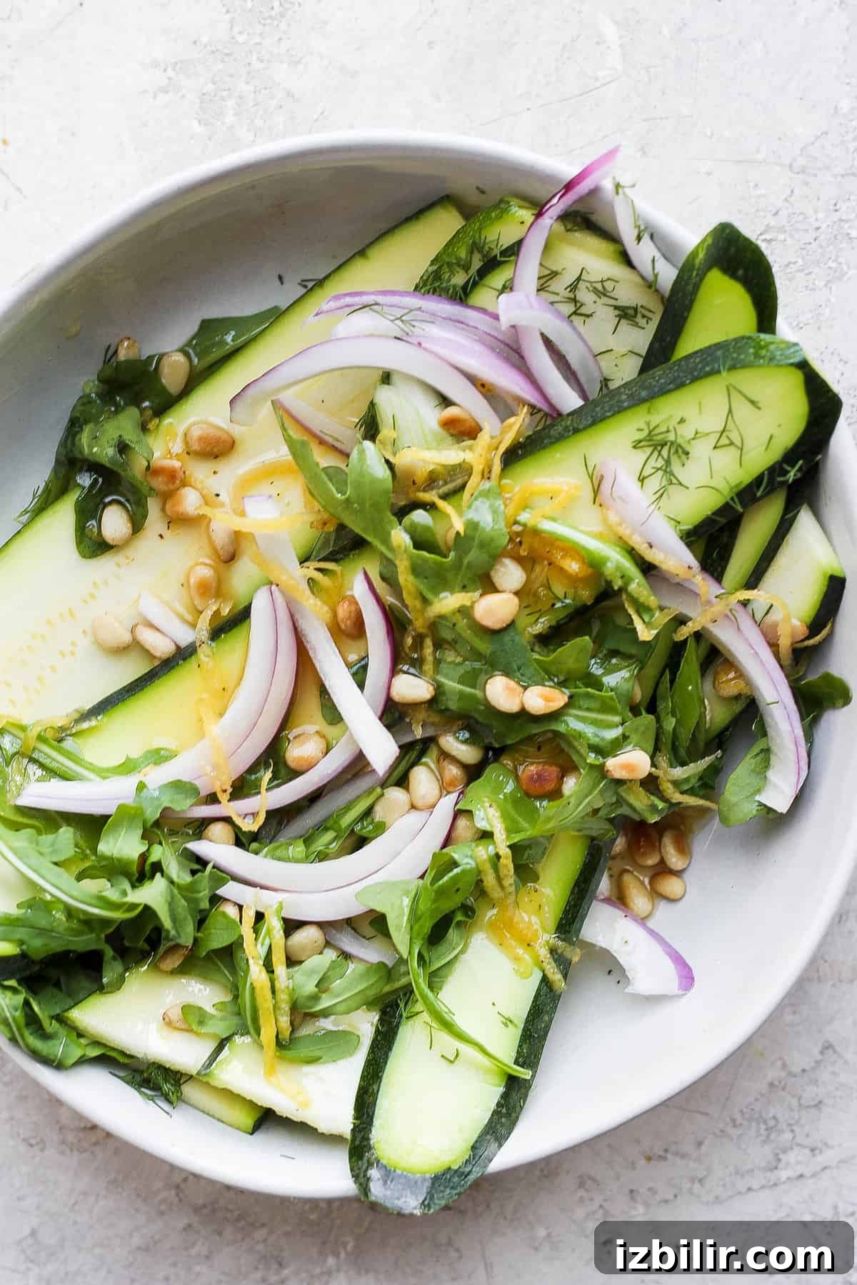 Zucchini salad drizzled with dressing zucchini salad ingredients drizzled with a homemade salad dressing