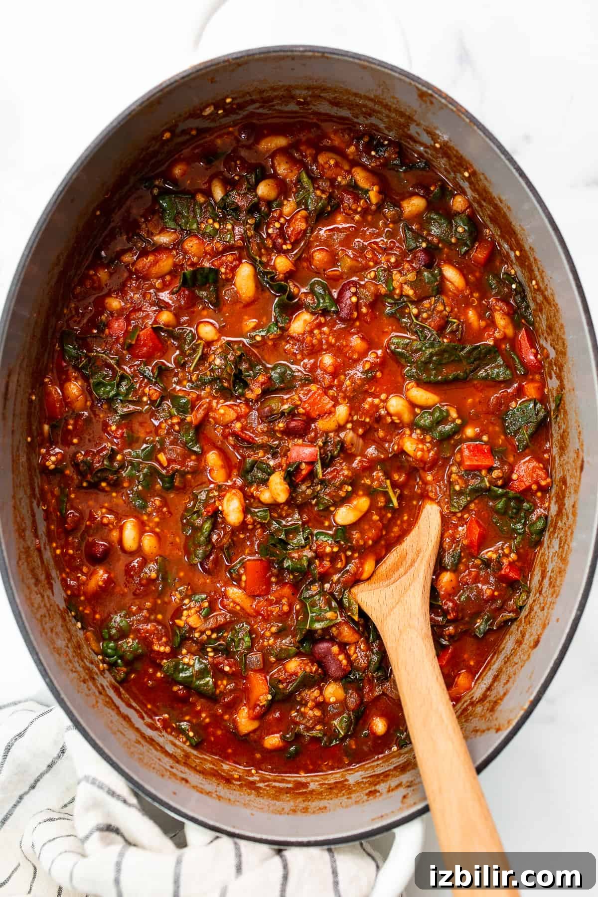 Hearty quinoa chili ready to serve. quinoa chili in Dutch oven.