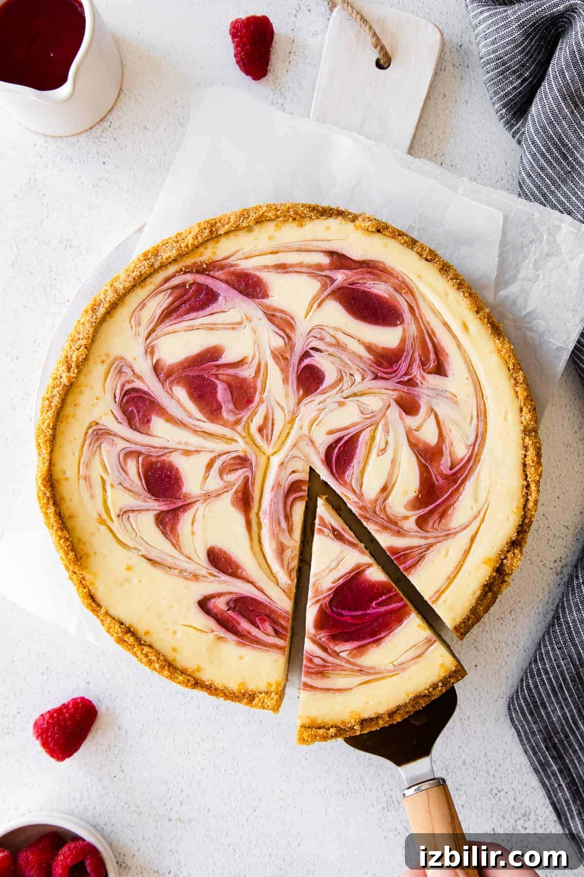 Greek Yogurt Cheesecake with raspberry swirl greek yogurt cheesecake with a raspberry swirl