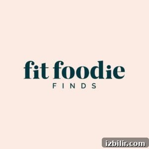 Dry Rub for Smoked Chicken: BBQ Seasoning Recipe 2 A light pink background features the text "fit foodie FINDS" in dark green capital and lowercase letters.