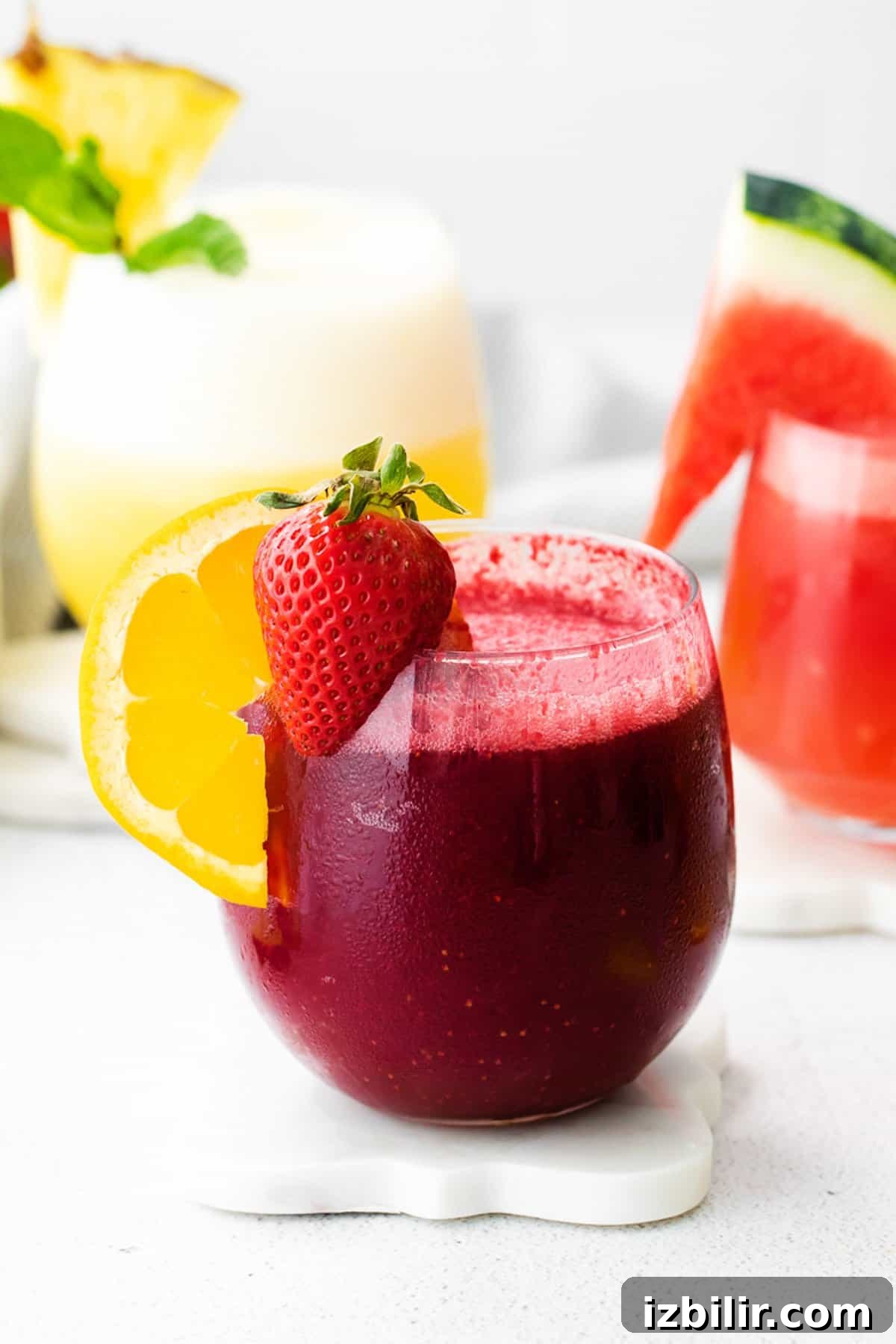 3 Wine Slushie Recipes for Summer Sipping 2 two glasses of watermelon and orange juice.