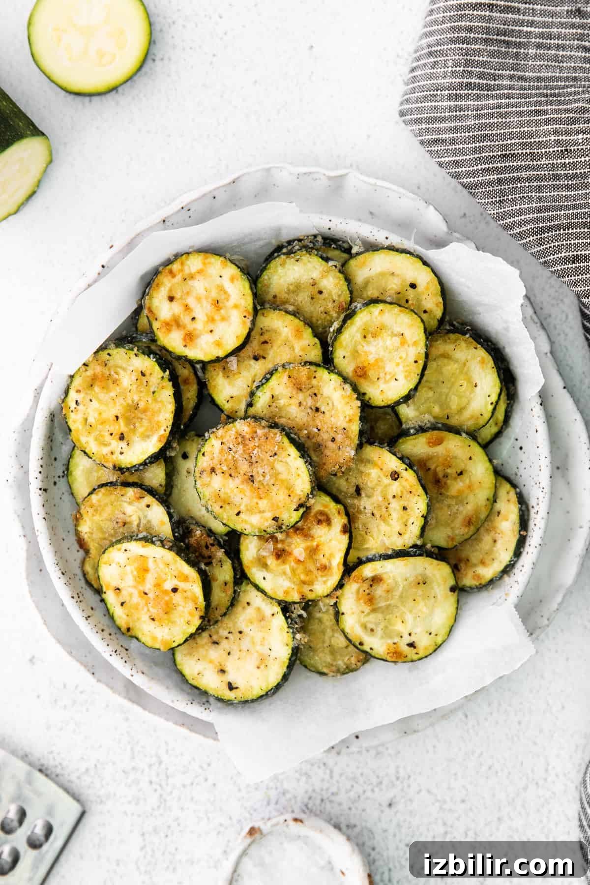 Parmesan Baked Zucchini Recipe 2 Baked zucchini in a bowl.