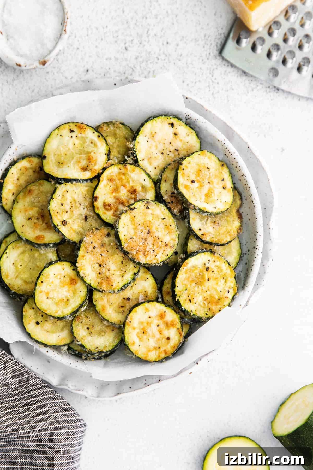Parmesan Baked Zucchini Recipe 5 Zucchini covered in parmesan, salt, pepper, and garlic.