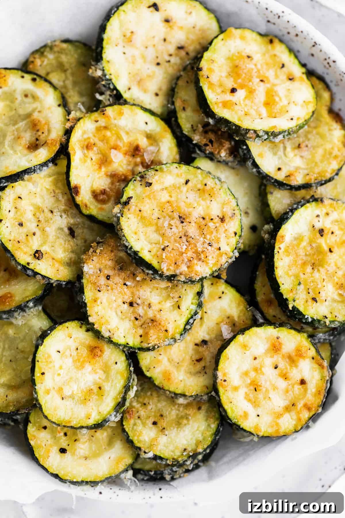 Parmesan Baked Zucchini Recipe 6 Baked zucchini in a bowl.