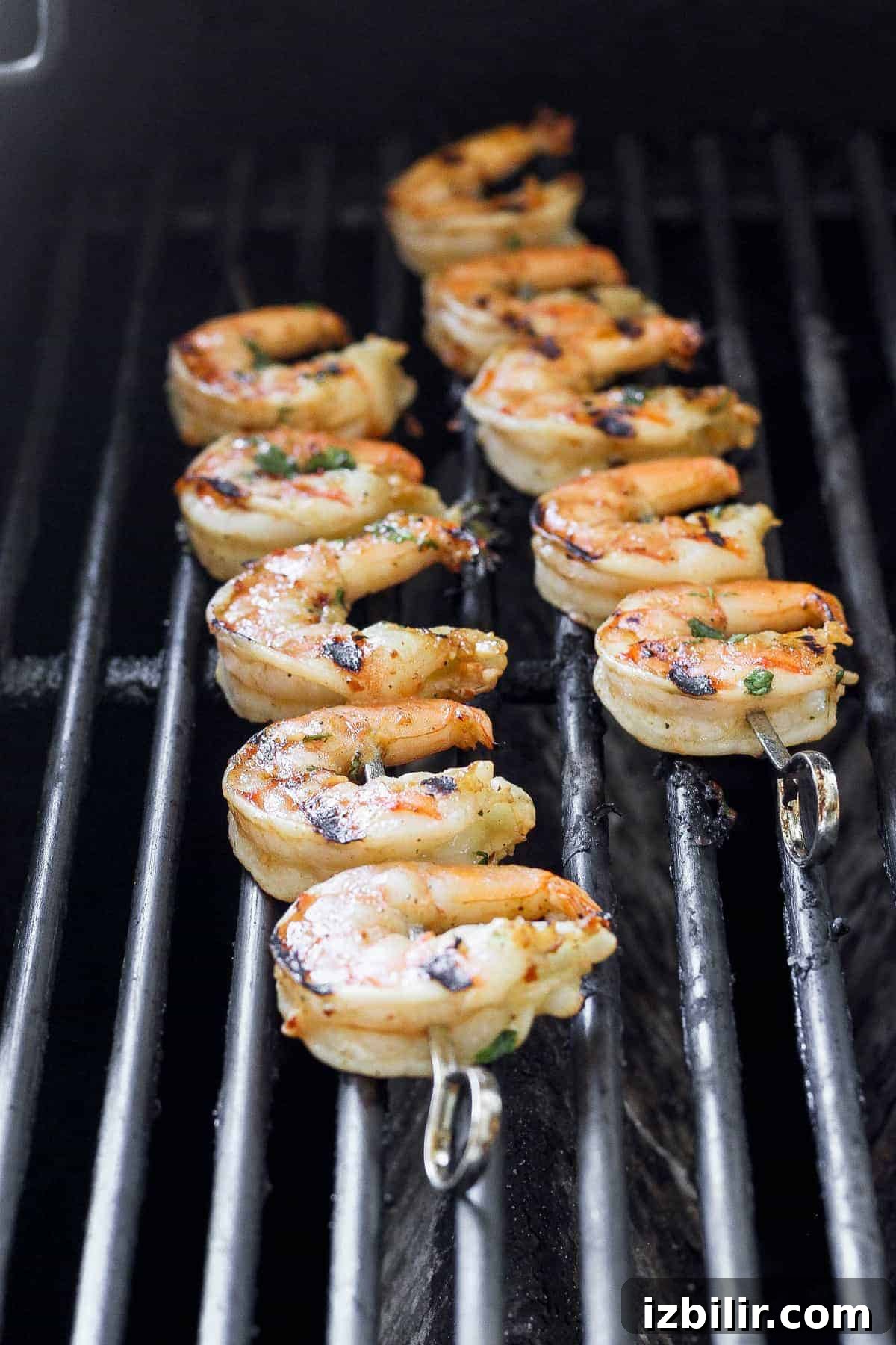 Grilled shrimp skewers on the grill Grilled shrimp on skewers on the grill.
