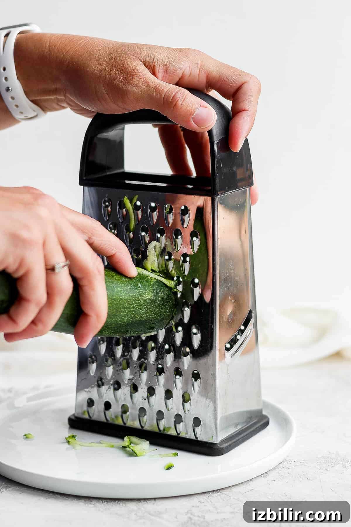 grating zucchini.