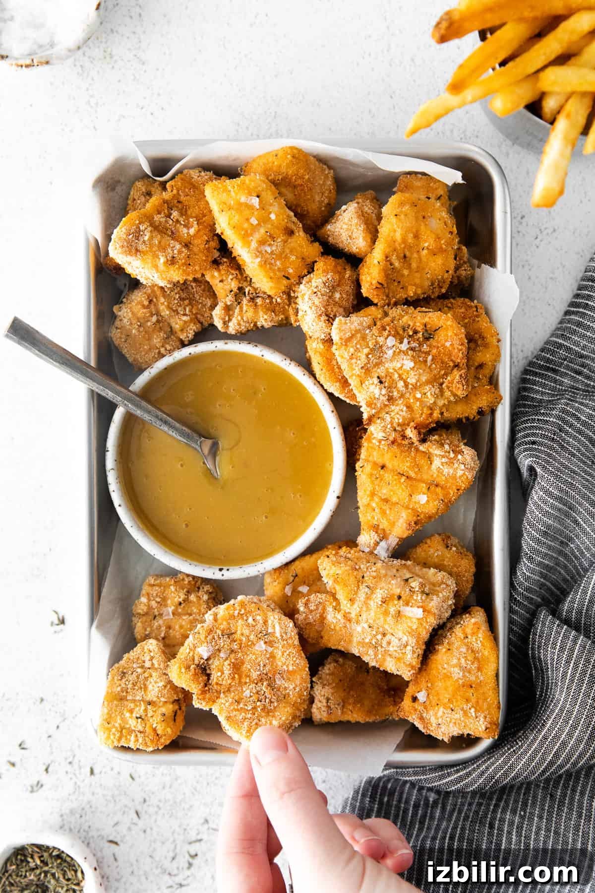 chicken nuggets on baking sheet