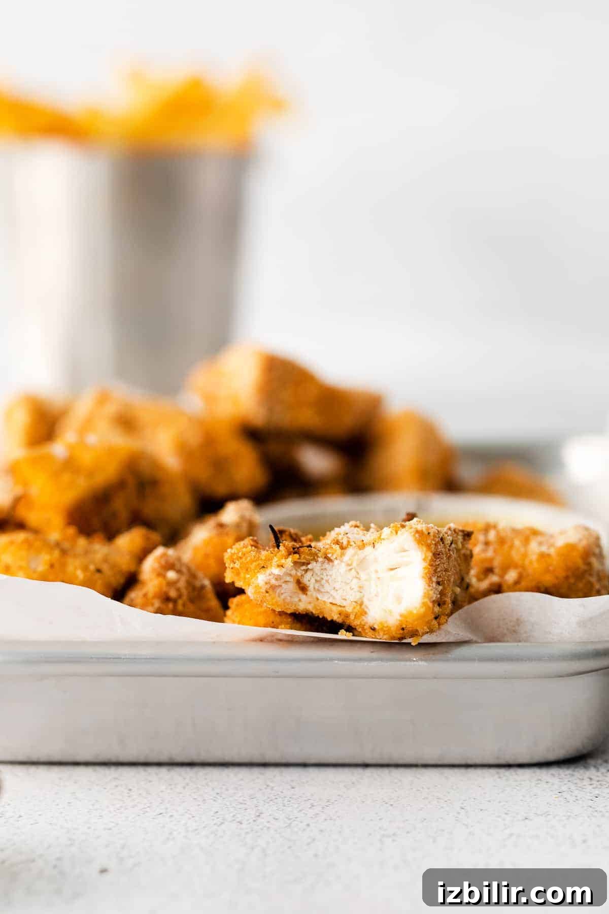chicken nuggets in metal baking sheet