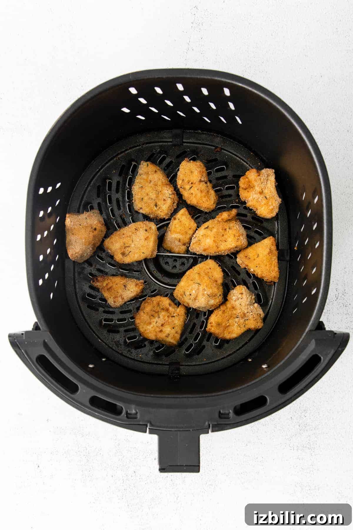 Air fryer chicken nuggets after they've been cooked.