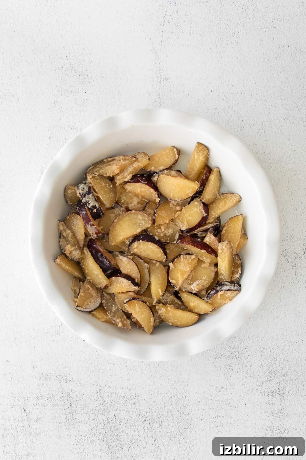 fresh plums inside baking dish