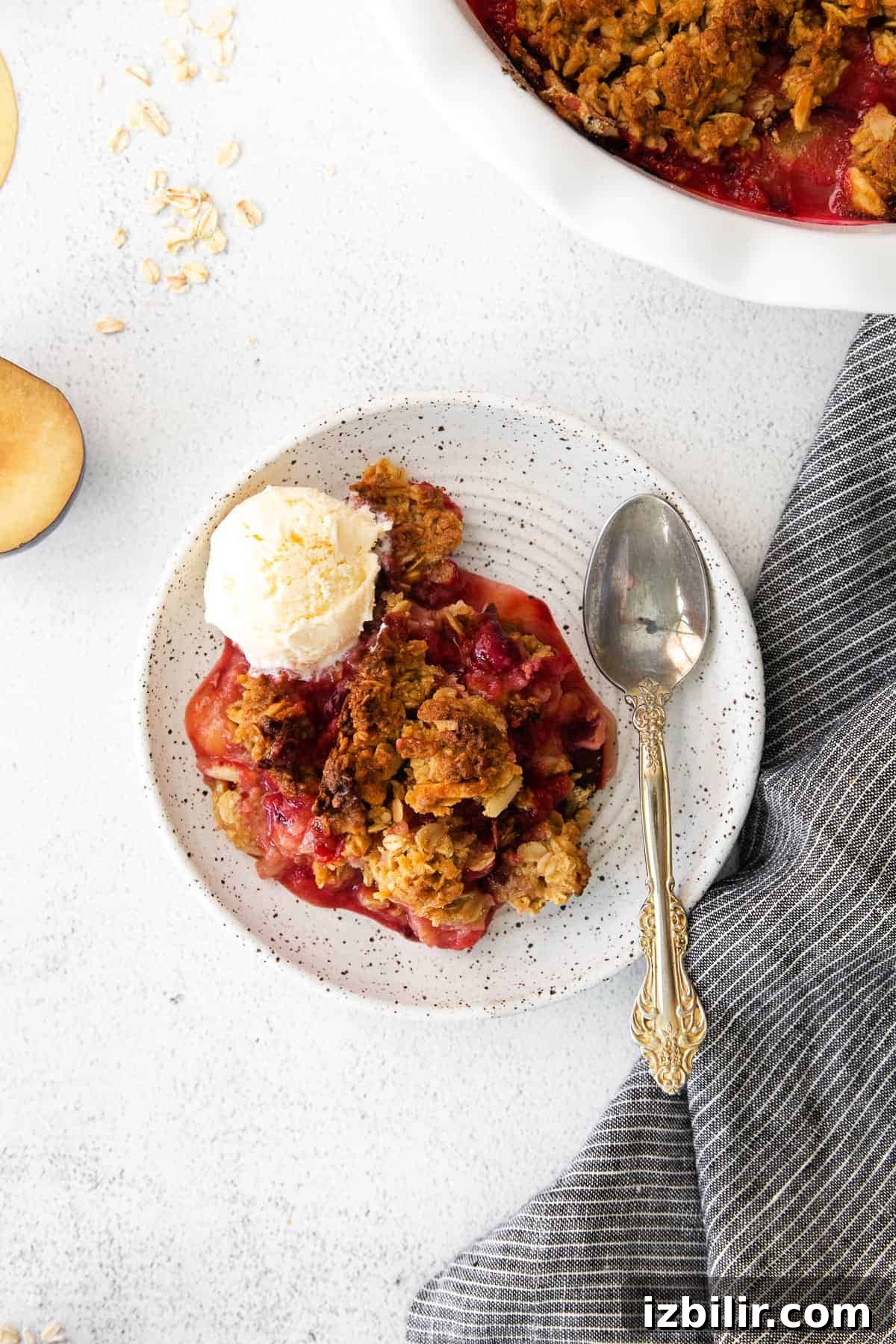 serving of crisp on plate with spoon